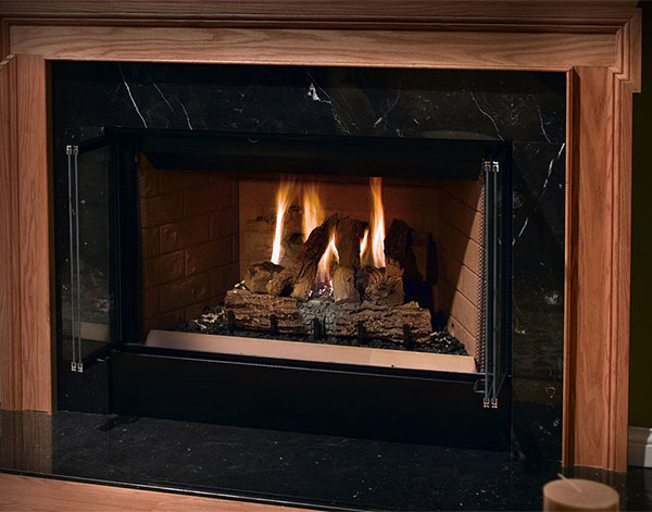 We sell gas fireplaces like this one with the marble and wood surrounding.