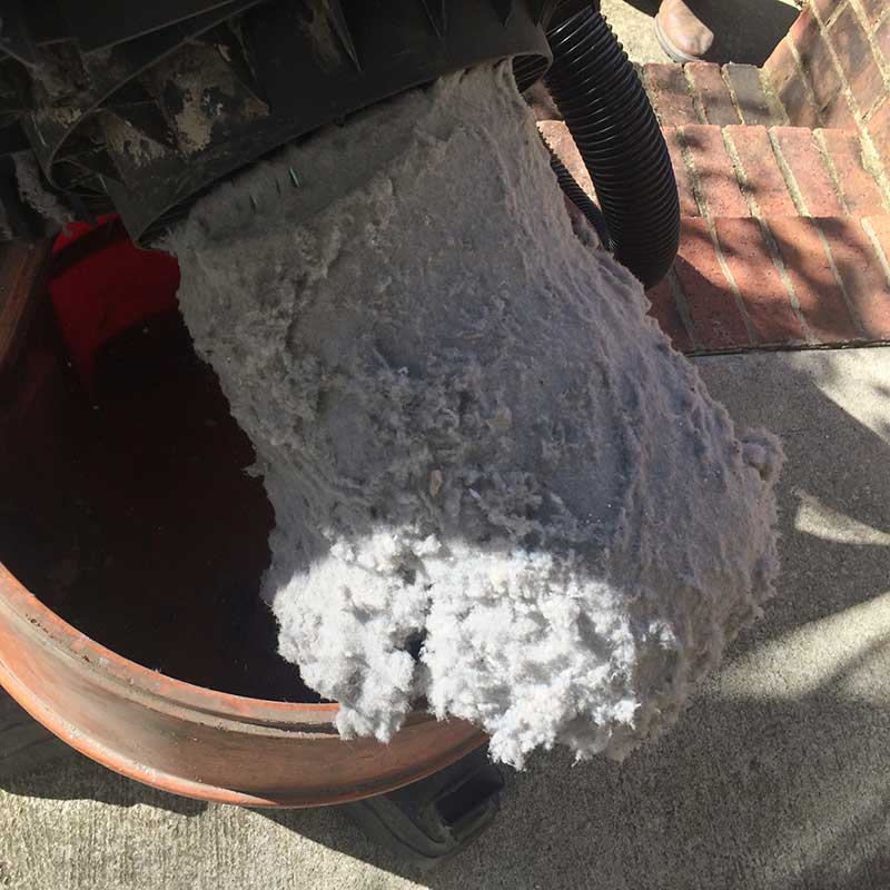 Dryer Vent Cleaning - Vacuum loaded with lint.