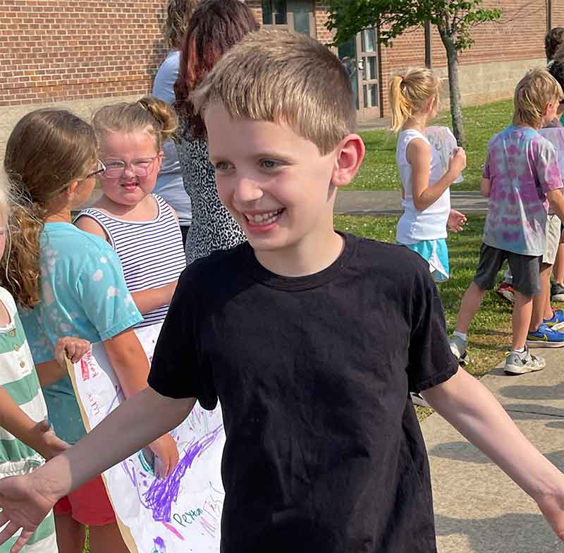 Picture of Cam and Kay Harmon's son smiling