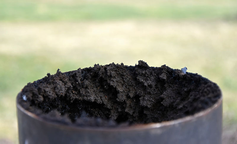 Close up view of built up creosote in a flue pipe