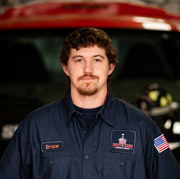 Original photo of Bryce Lay - Sweeps and Ladders Bryce Lay Lead Service Tech brown hair and eyes with a beard wearing a logo shirt.