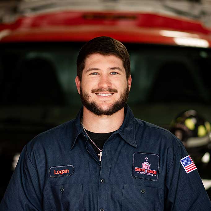 Original photo of Logan Cunningham - Sweeps and Ladders Logan Cunningham Lead Service Tech dark hair beard blue eyes